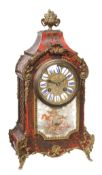 A French Louis XV style gilt brass mounted boulle mantel clock Retailed by W. Oppenheim, London