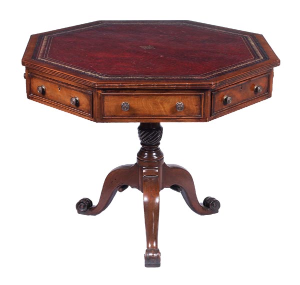 A mahogany octagonal topped and leather inset drum table, circa 1800 and later, frieze drawers,