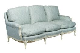 A cream painted and upholstered three piece suite of seat furniture in Louis XV style, late 19th/