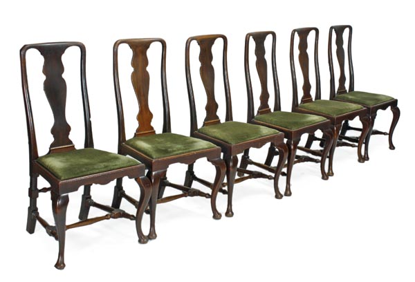 A set of six mahogany dining chairs in George I style, late 19th/early 20th century, shaped