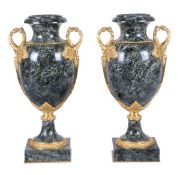 A pair of gilt metal mounted green serpentine marble urns, last quarter 20th century, with moulded