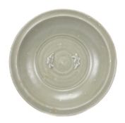 A Chinese Longquan celadon Ôtwin-fishÕ dish, the exterior with deep rounded sides carved with a