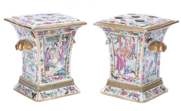 A pair of Chinese Canton bough pots, each of typical flared, square-section form resting on a