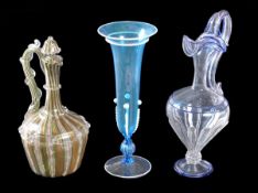 Three items of Venetian glass, comprising; a clear-glass ewer with blue trailed ornament, possibly