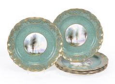 Six Royal Worcester powder-green ground plates signed by G.M. Evans, decorated in the manner of