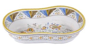 An English pearlware Pratt-type bidet, the interior painted with stylised flowers beneath a stiff-