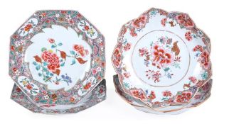 A pair of Chinese porcelain famille rose lotus petal shape saucer dishes painted with flowers, and