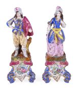 A pair of French porcelain figures wearing seventeenth century dress, Paris or Limoges, on