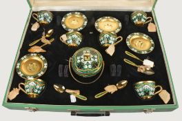 A Soviet Russian silver coloured gilt and enamel coffee service, post 1958 .916 standard, circa