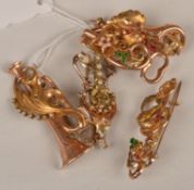 Five early 20th century seed pearl and gemset Sicilian brooches, one designed as key with a foliate