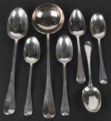 Taken by CM to Donnington.. An Edwardian silver Hanoverian pattern serving spoon and three table