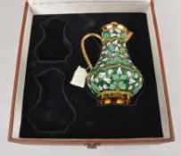 A Soviet Russian silver coloured gilt and enamel baluster jug and cover, post 1958 .916 standard,