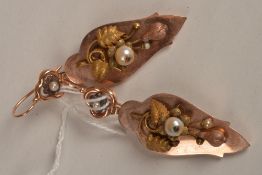 A pair of 19th century pendant earrings, the gold coloured trefoil tops with seed pearl flowerhead