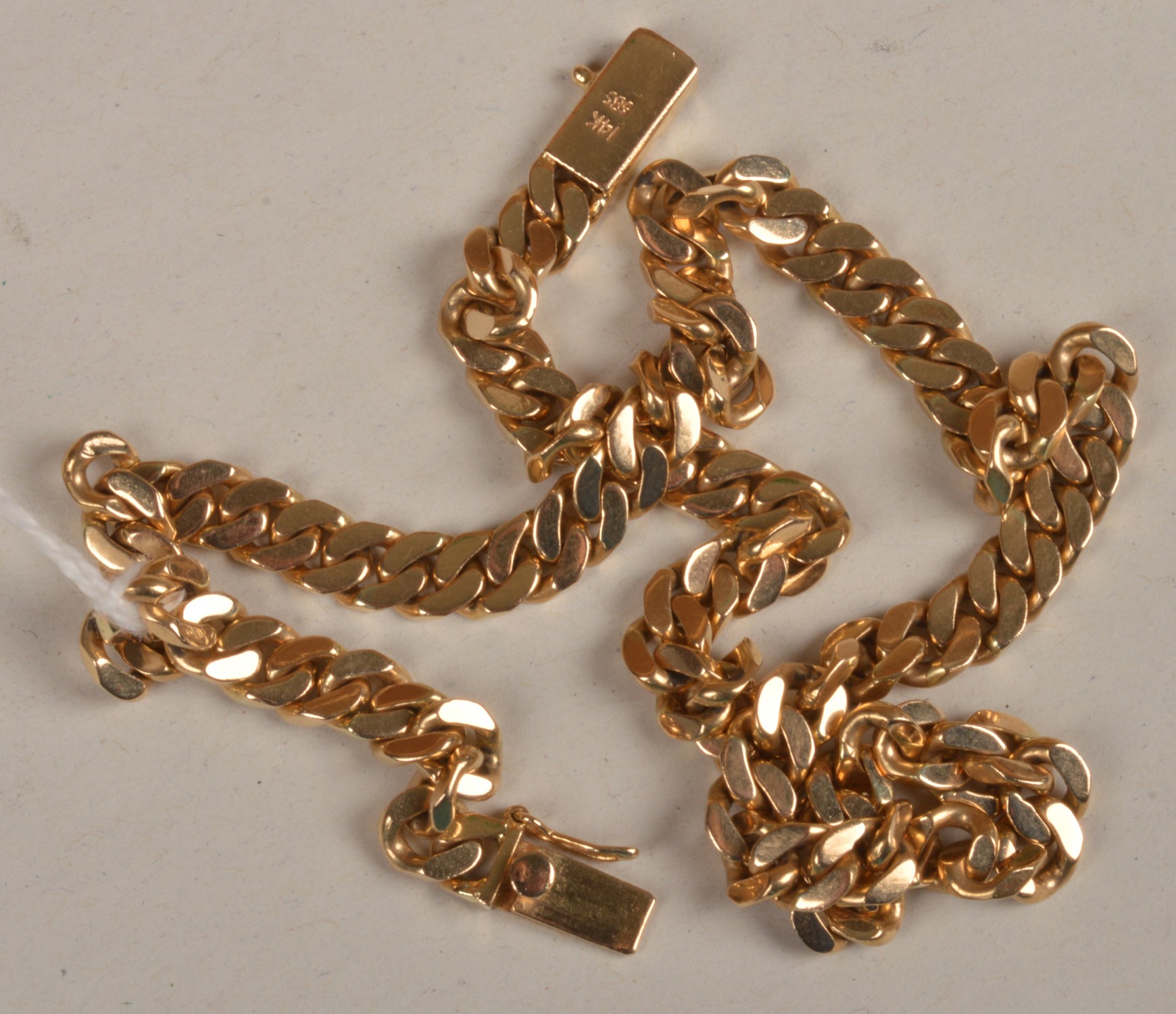 A flattened curblink neckchain, on a rectangular snap clasp, necklace length 38cm, weight 42g