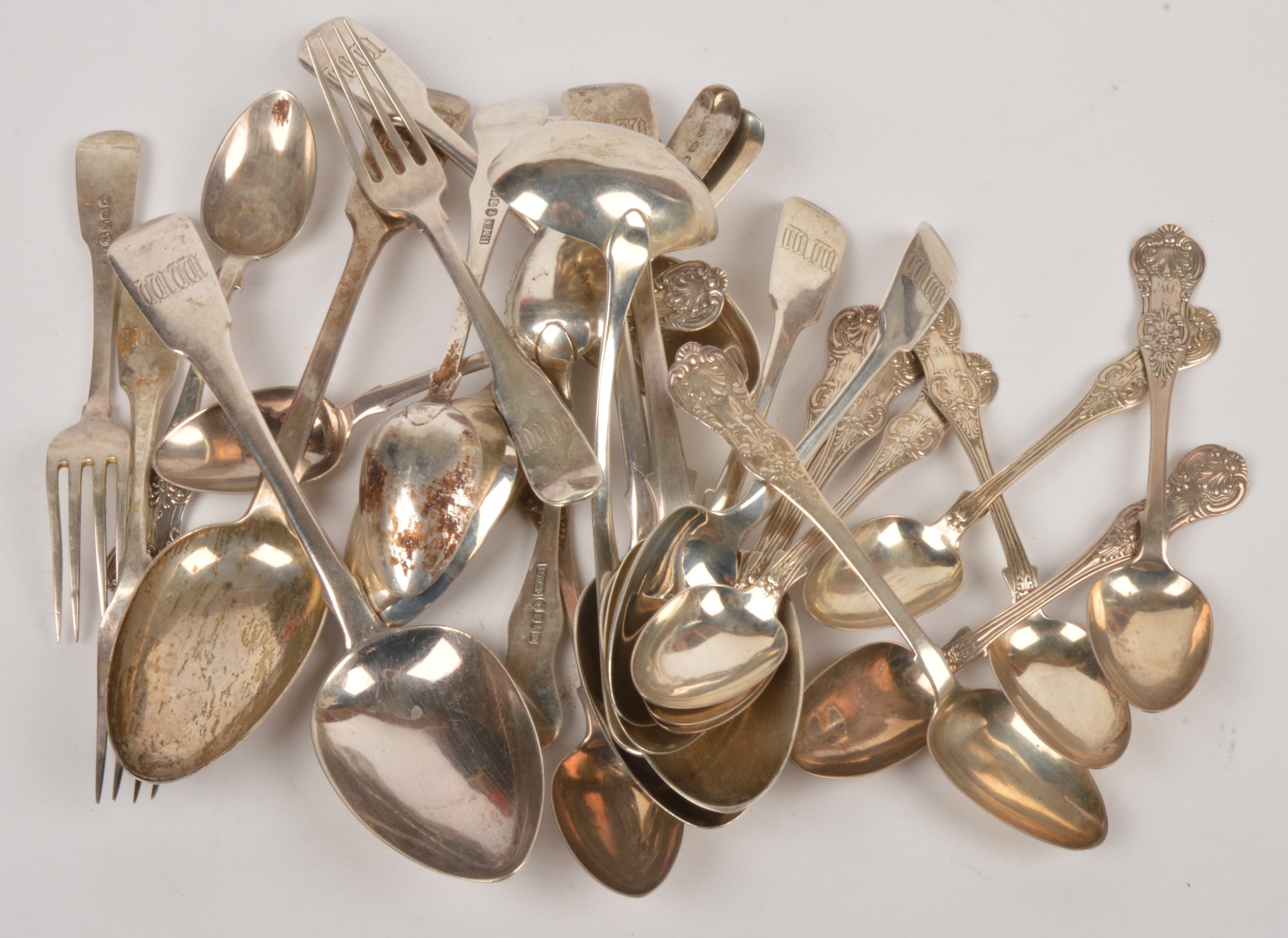 A quantity of silver flatware, to include: two George III silver fiddle pattern table spoons by