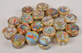 Nineteen Halcyon Days enamel circular boxes, all for Christmas for 1988-2001 and 2003-2007