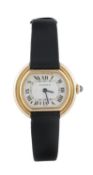 Cartier, a lady`s 18 carat gold wristwatch, no. 670813337, the two piece screw down case with white