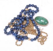 A 9 carat gold rope chain, 9.5g; a belcher link chain; a sodalite bead necklace; and a green