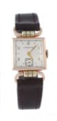 Longines, a 1940s 14 carat gold wristwatch, no. 692956, the two piece square case stamped `14k`