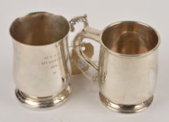 A silver baluster beaker by Adie Brothers Ltd., Birmingham 1932, with a scoll handle, engraved with