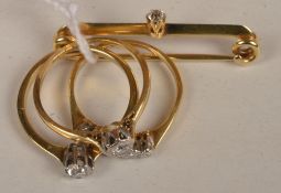 Three diamond set Victorian rings and a diamond set bar brooch, including: a diamond single stone
