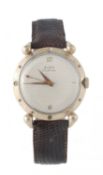 Elgin, De Luxe, a 1950s gold plated and stainless steel wristwatch, the two piece circular screw