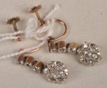 A pair of Edwardian diamond drop earrings, the diamond flowerhead cluster bottoms below an