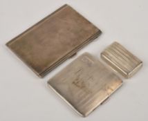 A silver rectangular cigarette case by Frederick Field, Birmingham 1934, with engine turned