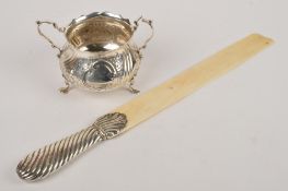 A Victorian silver baluster sugar bowl by Elkington & Co., London 1883, with a shaped border and