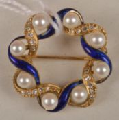 An 18 carat gold cultured pearl, enamel and diamond circlet brooch, makers mark `MP&Co` London 1974