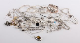* A quantity of silver, silver coloured and white metal jewellery, comprising; seventeen rings;