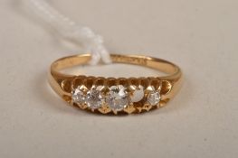 A diamond ring, set with graduated old-cut diamonds (one missing), estimated total diamond weight