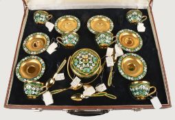 A Soviet Russian silver coloured gilt and enamel coffee service, post 1958 .916 standard, circa