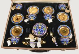 A Soviet Russian silver coloured gilt and enamel coffee service, post 1958 .916 standard, circa