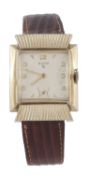 Elgin, a gold filled and stainless steel wristwatch, ref. 6528, no. U947804, the square case with