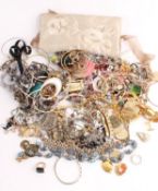 * A collection of costume jewellery, including; rings; bracelets; chains; beads; and pendants; aslo