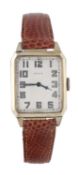 Elgin, a 1950s gold filled wristwatch, the two piece rectangular case with matt silvered dial,