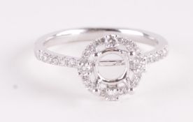 * A diamond ring, the thirty eight brilliant cuts totalling approximately 0.32 carats, with a
