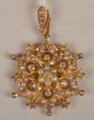 An Edwardian diamond and half pearl floral cluster brooch, set throughout with old-cut diamonds and