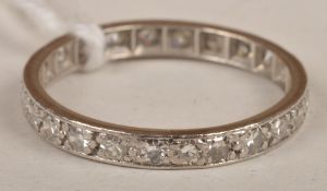 A diamond eternity ring, set all round with twenty four single-cut stones, estimated weight