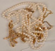 A pearl and diamond two row necklace, the open work diamond set articulated section on two rows of