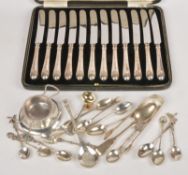 A small quantity of silver, to include: a set of twelve silver handled tea knives by Cooper