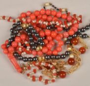 A coral and pearl necklace and an enamel and pearl bracelet, the necklace alternating two pearls