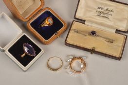 An Edwardian amethyst bar brooch, a citrine ring, the octagonal shape stone with tapered engraved