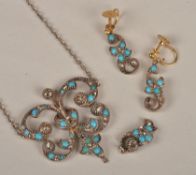 A diamond and turquoise pendant and earrings, the articulated pendant drop suspended below an