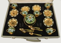 A Soviet Russian silver coloured gilt and enamel coffee service, post 1958 .916 standard, circa
