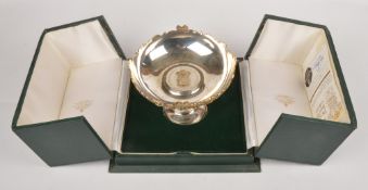 A silver parcel gilt dish by Garrard & Co., London 1981, commemorating the wedding of Prince