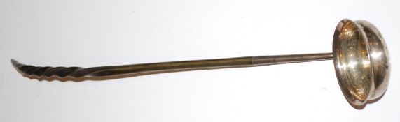 A William IV silver toddy ladle by John Mitchell, Glasgow 1834, with a part twisted baleen handle,