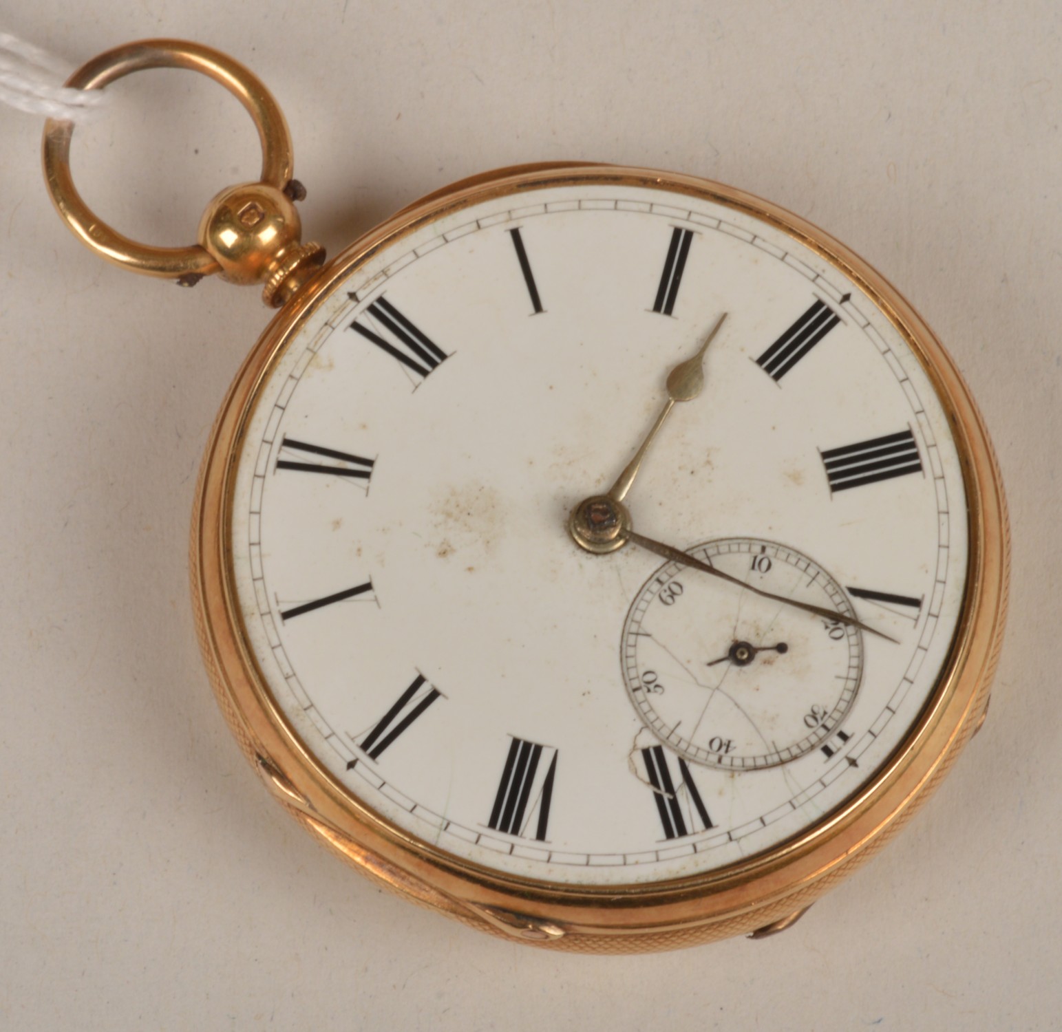 An 18ct gold openface keywood pocketwatch, the white enamel dial (cracked) with roman numerals,