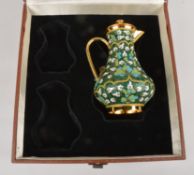 A Soviet Russian silver coloured gilt and enamel baluster jug and cover, post 1958 .916 standard,